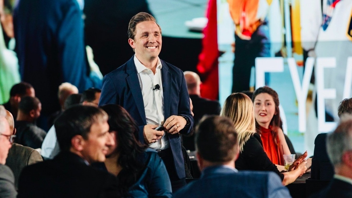 Frankie Russo engaging directly with attendees during a keynote
